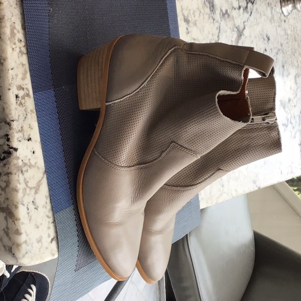 Beige low  leather boots.
